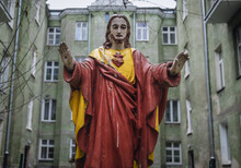 Small Shrine With Statue Of Jesus In Front Of Residential Building On Targowa Street In Warsaw, Poland