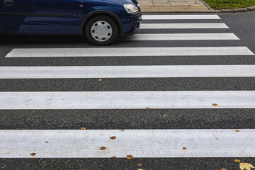 Poster - Car on pedestrian crossing in Warsaw city, Poland