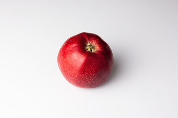 Red ripe apple on white background