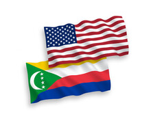 National Vector Fabric Wave Flags Of Union Of The Comoros And USA Isolated On White Background. 1 To 2 Proportion.
