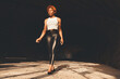 © ADDICTIVE STOCK - Stylish black woman in tunnel