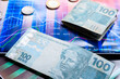 © Edson Souza - Brazilian money over a chart