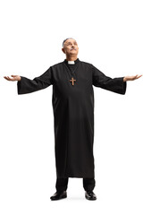 Canvas Print - Full length portrait of a mature priest standing and raising arms