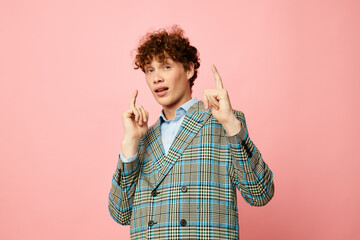 portrait of a young curly man checkered blazer elegant style posing fashion Lifestyle unaltered