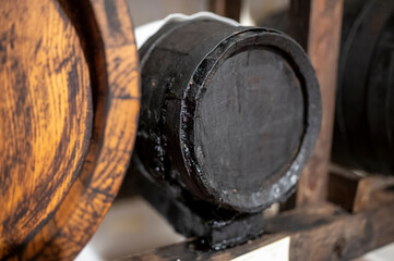 Wall Mural - Traditional production and aging in wooden barrels of Italian Balsamic grapes vinegar dressing in Modena, Italy