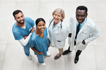 Working together as a coordinated and committed multidisciplinary team. Portrait of a group of medical practitioners standing together in a hospital.