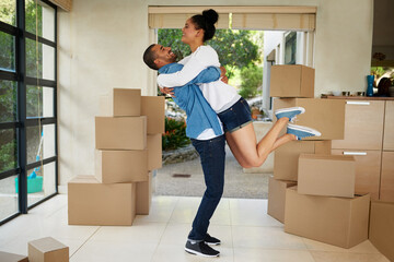 Aufkleber - They cant contain their excitement. Shot of a happy young couple celebrating their move into a new home.
