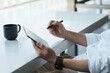 © PaeGAG - Close up hands  man using tablet, laptop and cellphone connecting wifi, copy space.