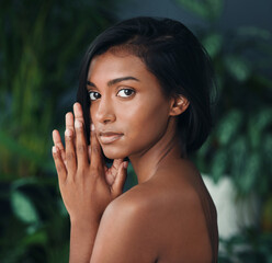 Poster - Make them stop and stare. Shot of a beautiful young woman posing against a dark background.