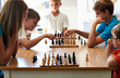 Chess champions. A group of kids playing chess.
