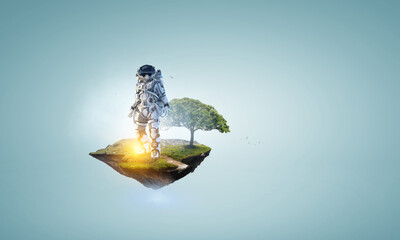 Wall Mural - spaceman on a light bulb