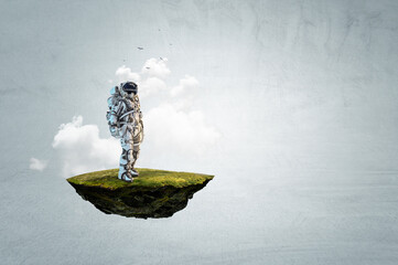 Wall Mural - spaceman on a light bulb