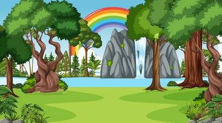 Wall Mural - Nature forest scene with rainbow in the sky