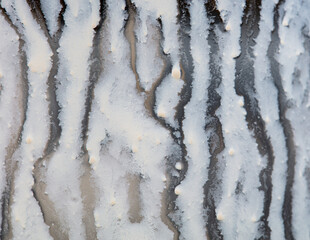 Sticker - Stained milk on the glass of a glass as a background.