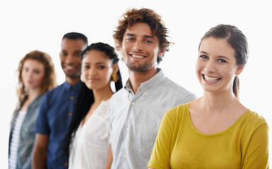 Wall Mural - They make a great business team. Cropped shot of a group of work colleagues against a white background.