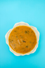 Poster - vegetable soup with spinach in beautiful bowl and spoon