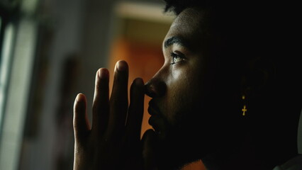 Wall Mural - Spiritual young man praying to God having FAITH and HOPE