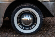 The White Wall Tire Of A Classic Car That Is Slightly Weathered In Winslow, Arizona.