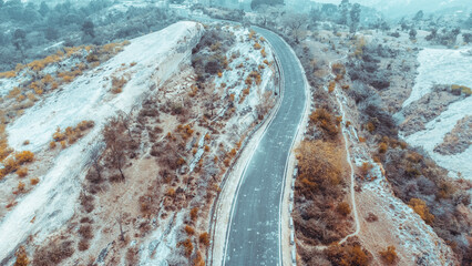 Sticker - Aerial shot of a beautiful forest in the winter