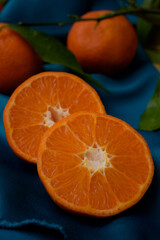 Wall Mural - Vertical shot of fresh juicy tangerine slices