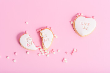 Sticker - Closeup of heart-shaped Valentine's day cookies on a pink background