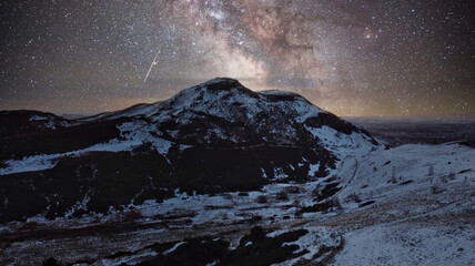 Wall Mural - beautiful shot of the milky way over snowy mountains