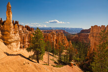 Scenic View Of Hikers In The Distance Looking Out At The Hoodoos In Bryce Canyon National Park, Utah