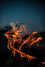 Vertical Shot Of Burning Fire On Dark Background