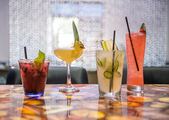 Wall Mural - Closeup of exotic alcohol drinks on a table in a restaurant