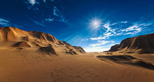 Desert Landscape With Blue Sky On The Background