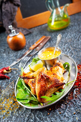 Canvas Print - plate of chicken wings on a table