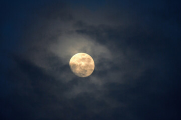 Wall Mural - Moon on a background of dramatic sky