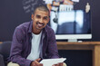 © Nola Viglietti/peopleimages.com - Getting the job done with the help of my tablet. Cropped portrait of a young designer working on his tablet in the office.