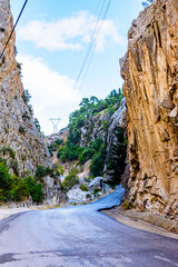 Wall Mural - Asphalt road in canyon not far from the city Kemer. Antalya province, Turkey