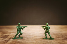 Image Of Toy Soldiers Over Wooden Table