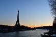 Paris, France. River Seine and Eiffel Tower at dusk. February 27, 2022.