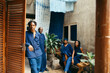 © christina nwabugo - group portrait of african eco textile designers sitting outdoors, smiling
