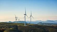 Turbines In A Mountain Wind Farm. Ecological Energy Production.
