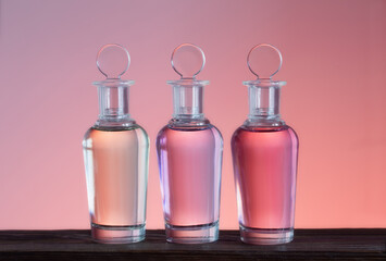 Wall Mural - bottles with magic potions on pink background