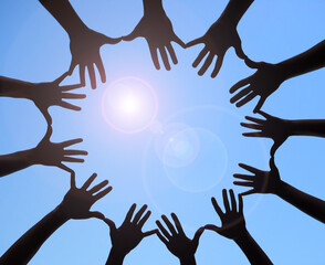 Canvas Print - Joining together to form one. Shot of a group of hands spread out together in a circle.