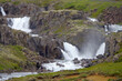Breathtaking scenery of mountains, galciers and waterfalls in Seydisfjordur, Iceland during cruising to Polar Sea with beautiful scenic panorama nature landscape in Fjord	