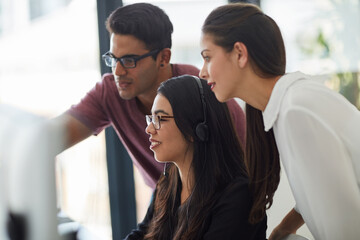 Aufkleber - They play a large role in the customers experience. Shot of colleagues working together in an office.