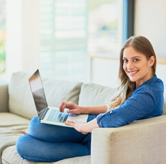 Sticker - Take a break. Browse. Portrait of an attractive young woman using her laptop while sitting on the sofa at home.