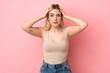 © luismolinero - Young caucasian woman isolated on pink background doing nervous gesture