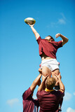 Capturing an epic moment. Shot of a young rugby player catching the ball during a lineout.