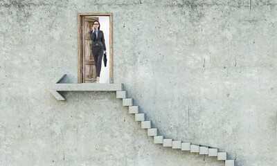 Wall Mural - Young businesswoman walking towards success