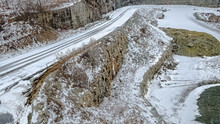 Snow Covered Gravel Road At Rock Quarry