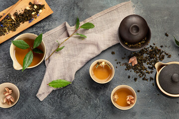 Sticker - Asian tea set on dark background.