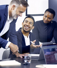 Poster - What should I do about that. Shot of a group of businesspeople using a laptop at work.