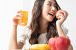 © Shutter B - Healthy lifestyle, Close up beautiful young asian woman with fruit juice smiling happy. Healthy eating, Food and lifestyle, Health, Beauty, Dieting concept.